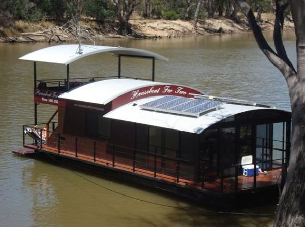 small - boat with esky on front            